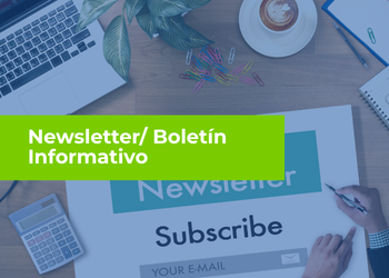 A desk workspace with a laptop, calculator, coffee cup, plant, and colorful paperclips, featuring a large green banner that reads “Newsletter/ Boletín Informativo” over an email subscription graphic.